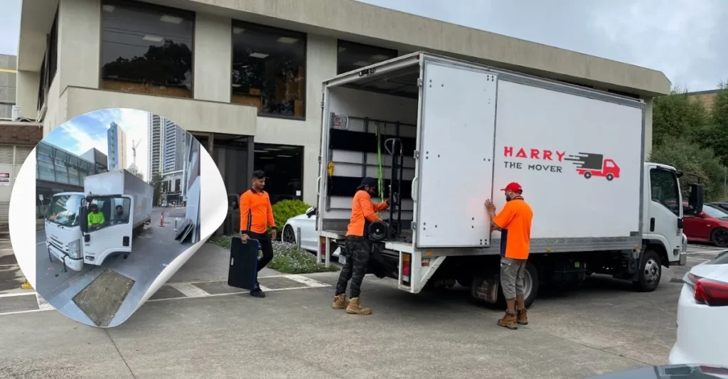 Harry The Mover Professional movers unloading a truck in front of a commercial building, showcasing efficient and reliable moving services.