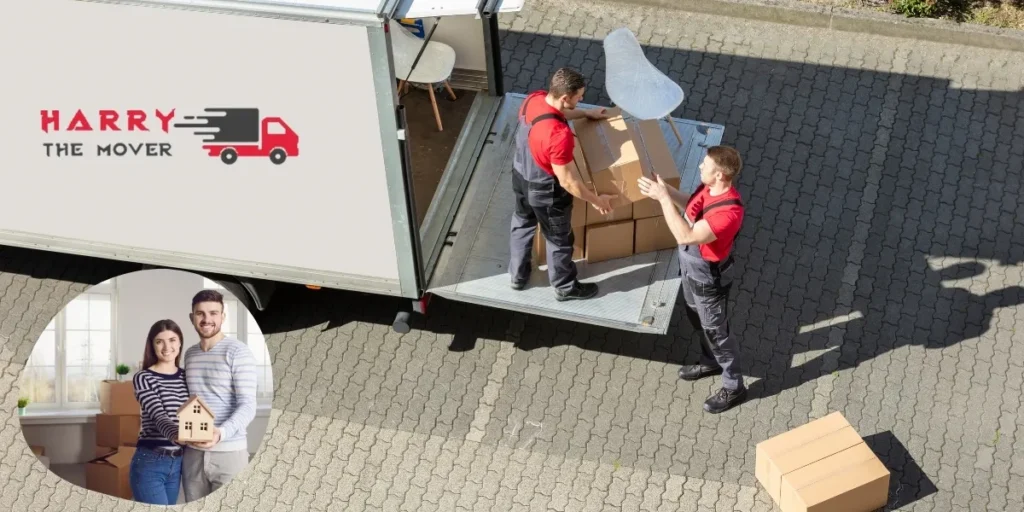 Harry the Mover's professional moving team loading boxes into a branded moving truck, displaying efficient moving services.